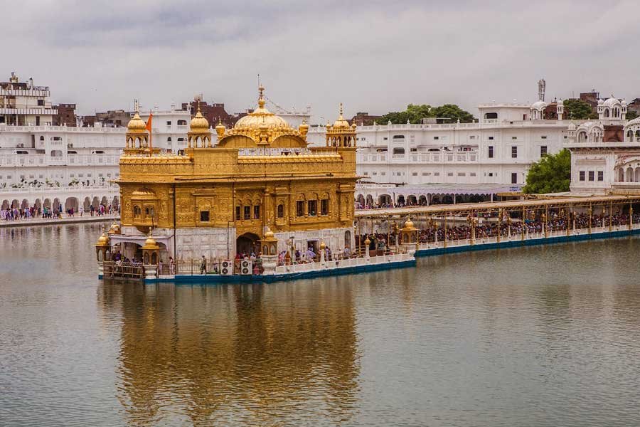 The Golden Temple, a famous Sikh shrine covered in gold and surrounded by a sacred water tank